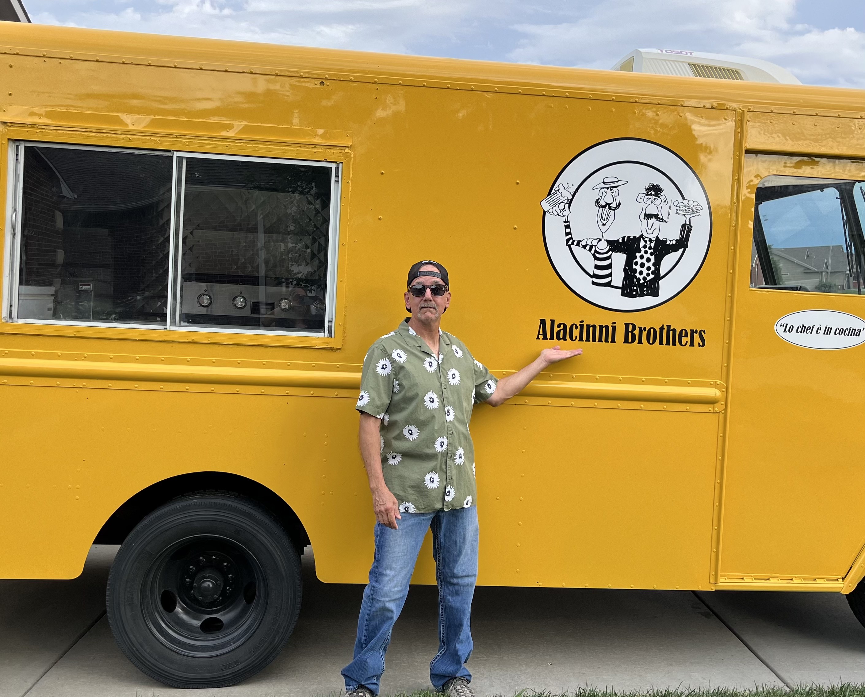 Tim Betts, proprietor of Alacinni Brothers, in front of the food truck